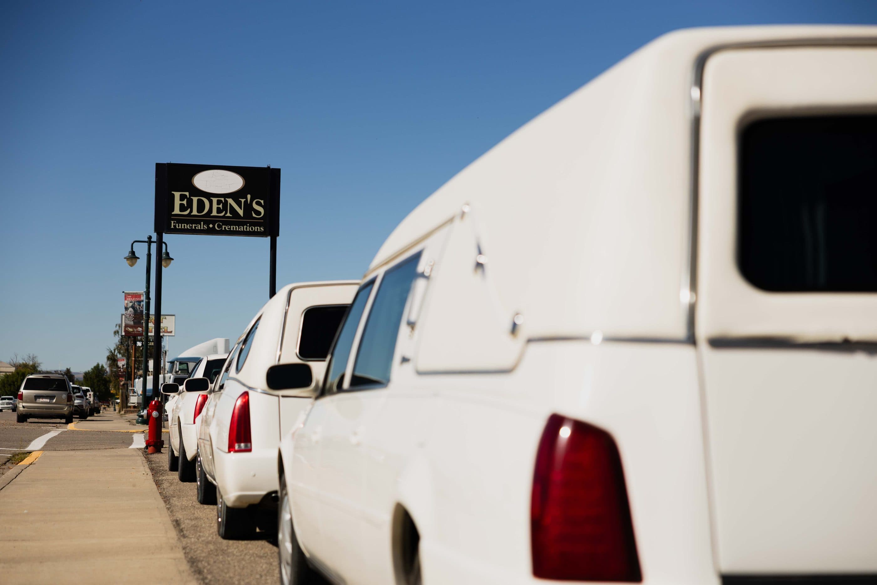 Eden's white hearses lined up outside the chapel